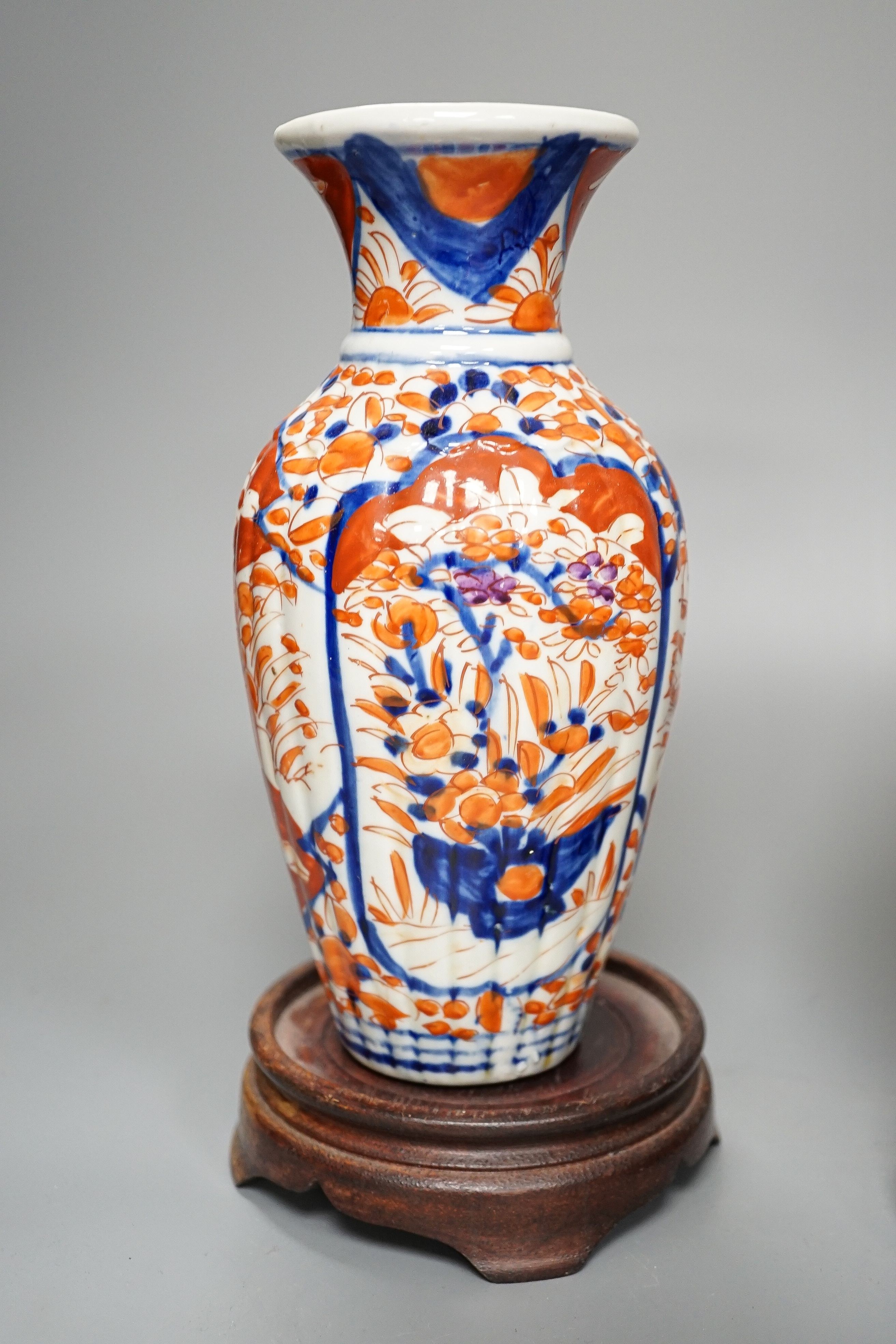 A Japanese Imari lamp and matching vase, 22 cm